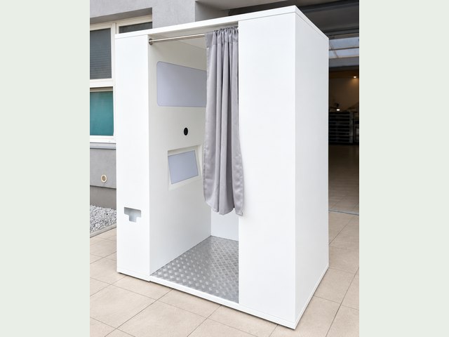 White stainless-steel photo cabin